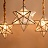 Дизайнерский подвесной светильник со стеклянным плафоном в форме многоконечной звезды MAGIC B фото 9