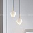 Серия подвесных светильников с разнотипными фигурными плафонами округлой формы из белого мрамора MIEL C фото 7